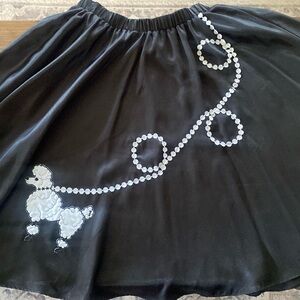 Poodle skirt, scarf, belt and tutu underskirt. Size medium